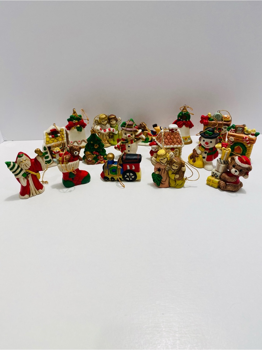 Holiday Ornaments VINTAGE porcelain approx 1”x2”. 16 ornaments